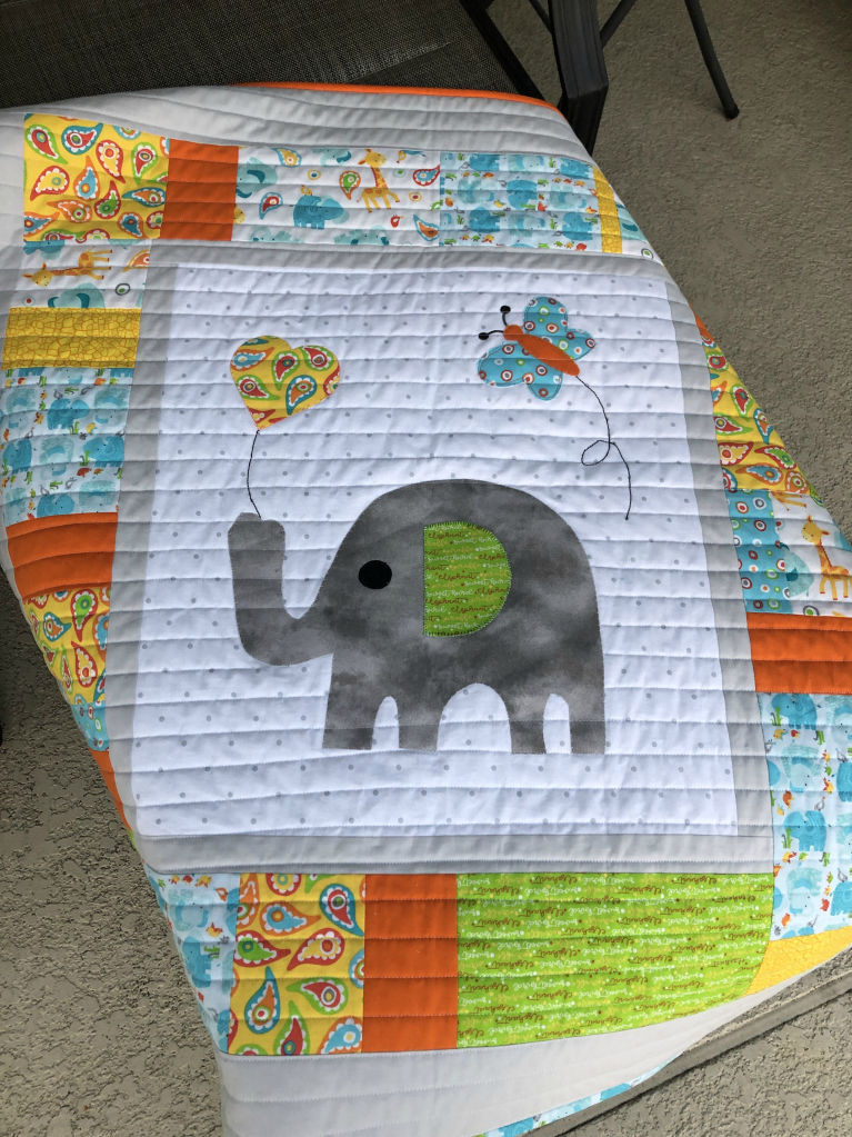 elephant applique baby quilt with cuddle backing