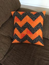 orange black chevron pillow