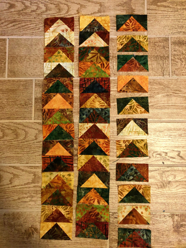 charm pack flying geese quilt wip